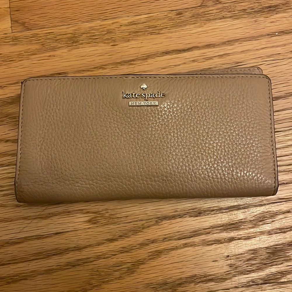Kate spade wallet- very good condition. Normal signs of use